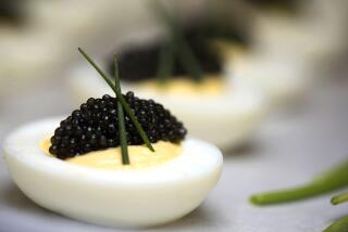 Deviled eggs with California white sturgeon caviar, adapted from a recipe by chef Thomas Keller.