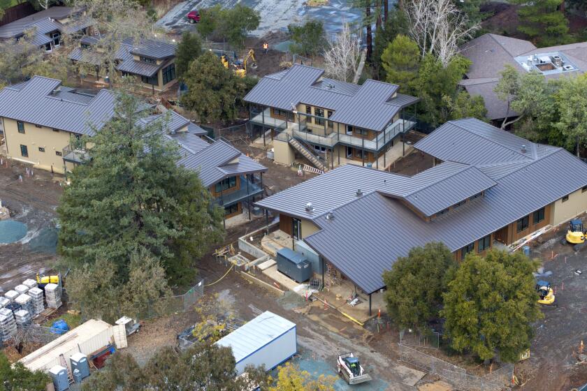 PORTOLA VALLEY VALIF. DECEMBER 12, 2024 -- An aerial of the "Willow Commons," housing under construction for developmentally disabled adults on Thursday, Dec. 12, 2024 in Portola Valley, Calif. (Paul Kuroda / For The Times)