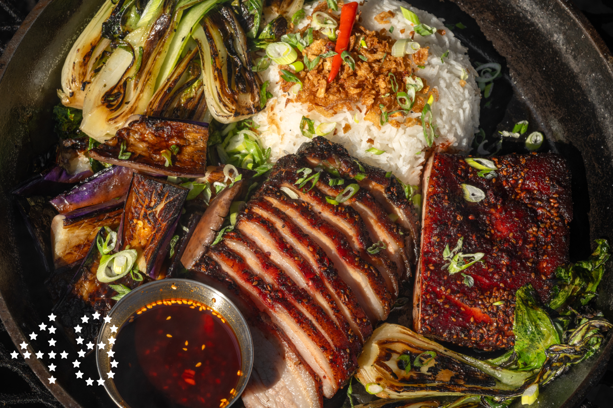 SAN JUAN CAPISTRANO, CA - OCTOBER 22, 2024: Smoked Pork Belly Char Siu with Charred Bok Choy at Heritage Barbecue in San Juan Capistrano. (Ron De Angelis / For The Times)