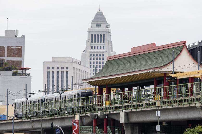 LOS ANGELES, CA - AUGUST 01: The Metro Rail A Line pulls into the Chinatown station on Thursday, Aug. 1, 2024. (Myung J. Chun / Los Angeles Times)