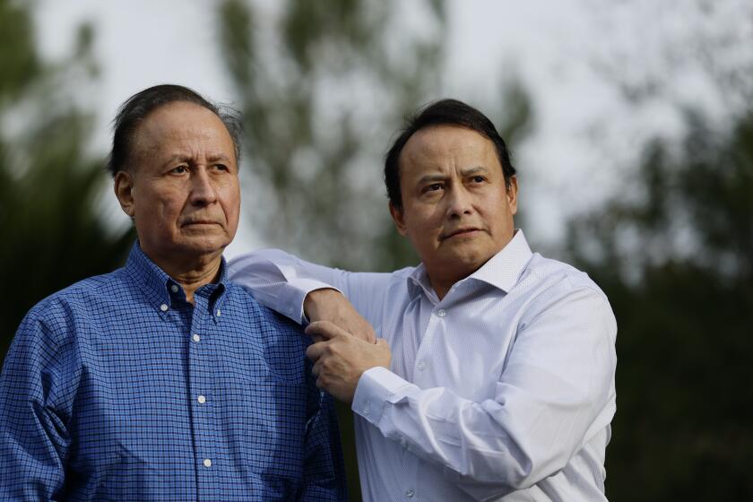 Anaheim Hills, CA - December 11: Thomas Perez Jr, and his father, Thomas Perez, Sr., are photographed in Anaheim Hills Wednesday, Dec. 11, 2024. Thomas Perez Jr. falsely confessed to killing his father, who was alive and well, after a 17-hour interrogation by Fontana police during which they lied about their evidence and told him his dog would be euthanized. The city of Fontana was ordered to pay Thomas Perez Jr $898,000 in damages, following the incident in 2018. (Allen J. Schaben / Los Angeles Times)