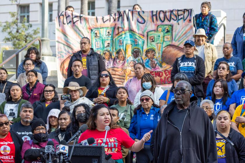 Los Angeles, CA - October 30: Gloria Martinez, center, United Teachers Los Angeles (UTLA) Treasurer, speaks during the Keep LA Housed Coalition news conference, which is a group of tenants, tenant rights advocates, public interest lawyers and community organizations outside Los Angeles City Hall in Los Angeles Wednesday, Oct. 30, 2024. Their goal is ``to show the L.A. City Council that a broad coalition of constituents, from tenant advocates to labor union members, are demanding changes to allowable rent increases under the Los Angeles Rent Stabilization Ordinance that will make it the more protective for tenants.'' Speakers included tenants, organizers, union members and council members Nithya Raman, Eunisses Hernandez and Hugo Soto-Martinez. (Allen J. Schaben / Los Angeles Times)