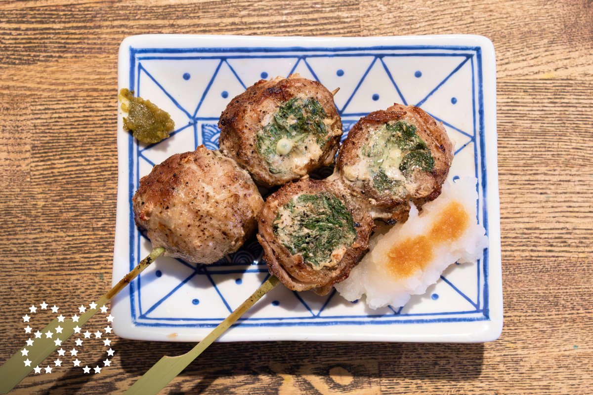 LOS ANGELES, CA - OCTOBER 29: Pork belly-wrapped chives skewers at Hakata Izakaya Hero in Los Angeles, CA on Tuesday, Oct. 29, 2024. (Myung J. Chun / Los Angeles Times)