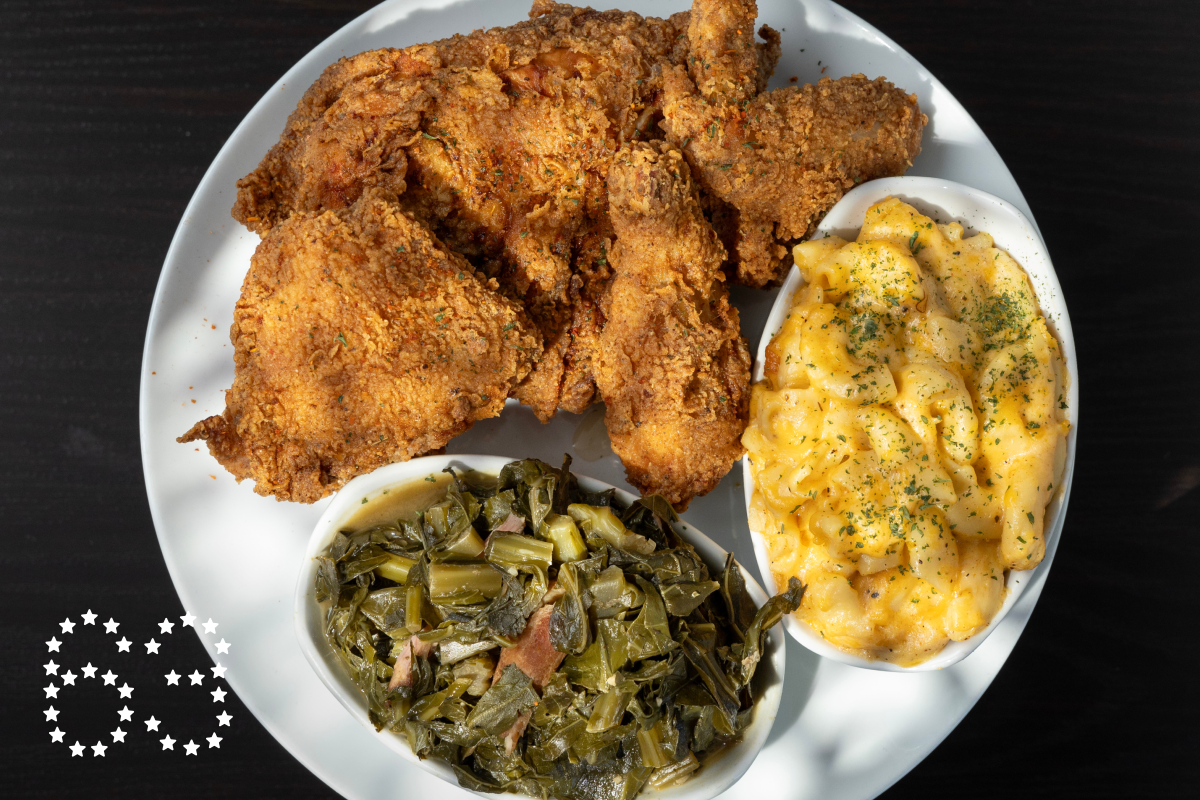 LOS ANGELES, CA - SEPTEMBER 24: Fried chicken with macaroni and cheese and collard greens at Dulan's on Crenshaw in Los Angeles, CA on Tuesday, Sept. 24, 2024. (Myung J. Chun / Los Angeles Times)